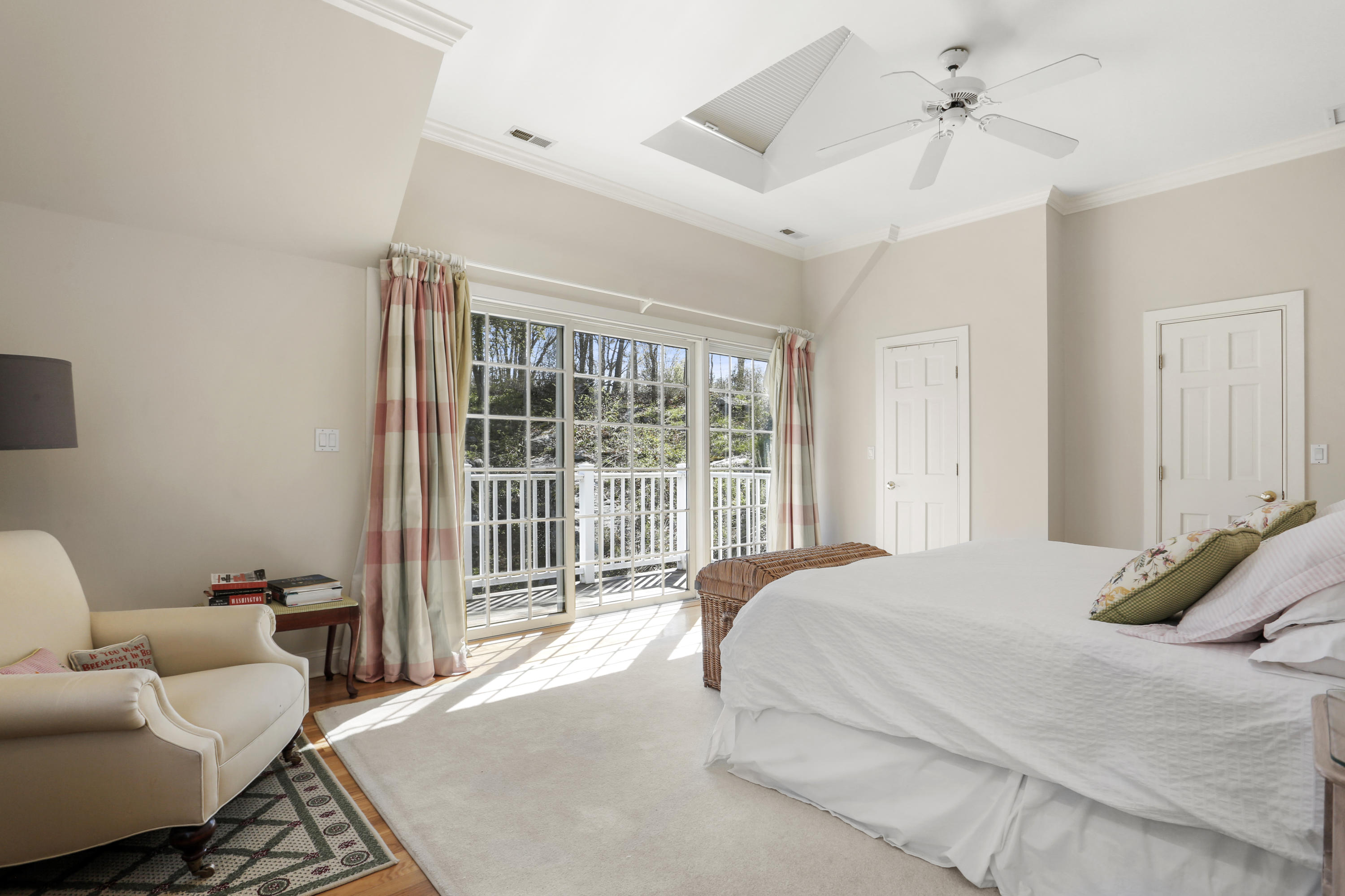 23 Fairmead Road Darien, CT 06820 - Photo 19 of 47 a bedroom with a bed and glass window