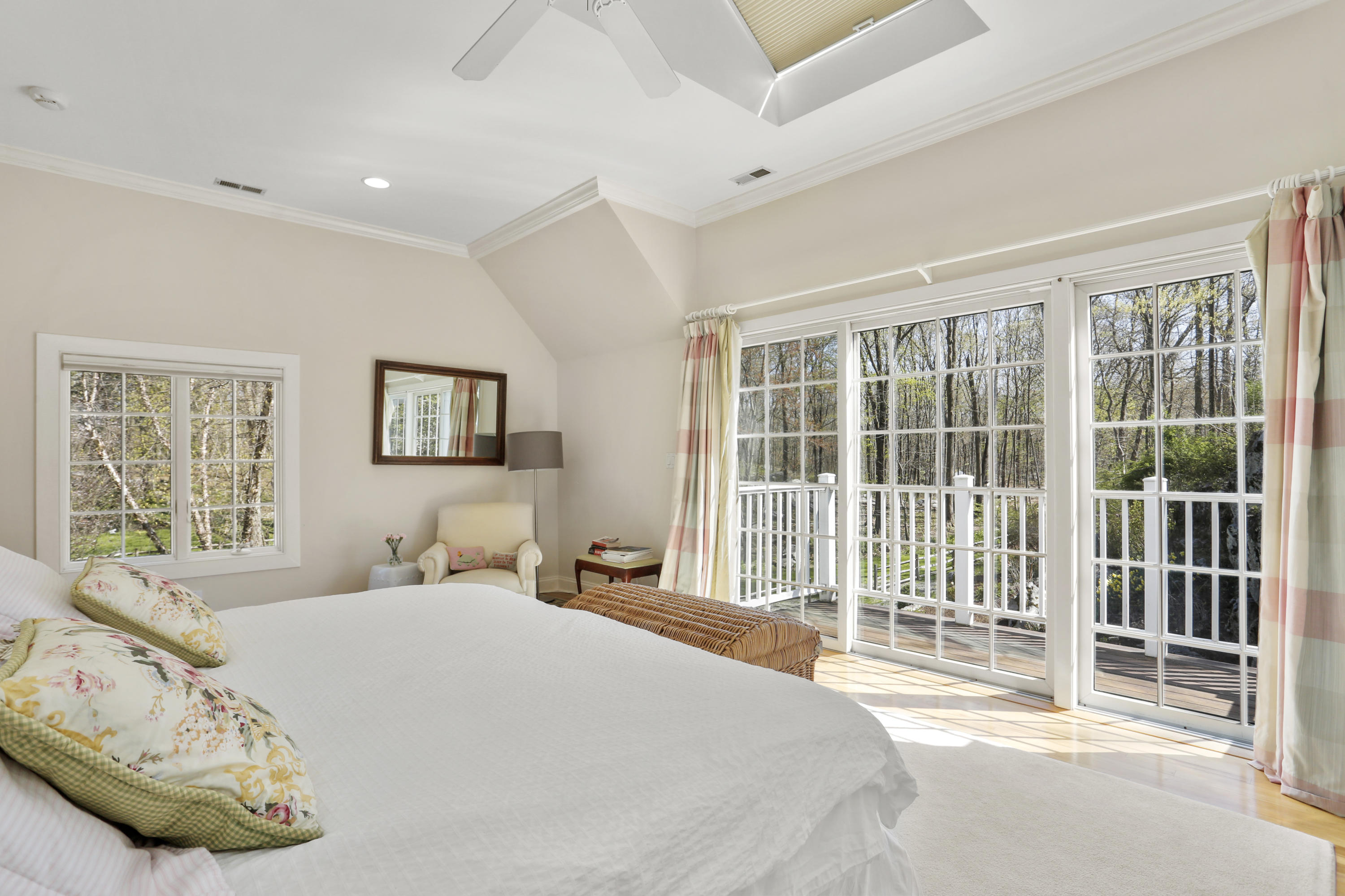 23 Fairmead Road Darien, CT 06820 - Photo 20 of 47 a bedroom with a large bed and a window