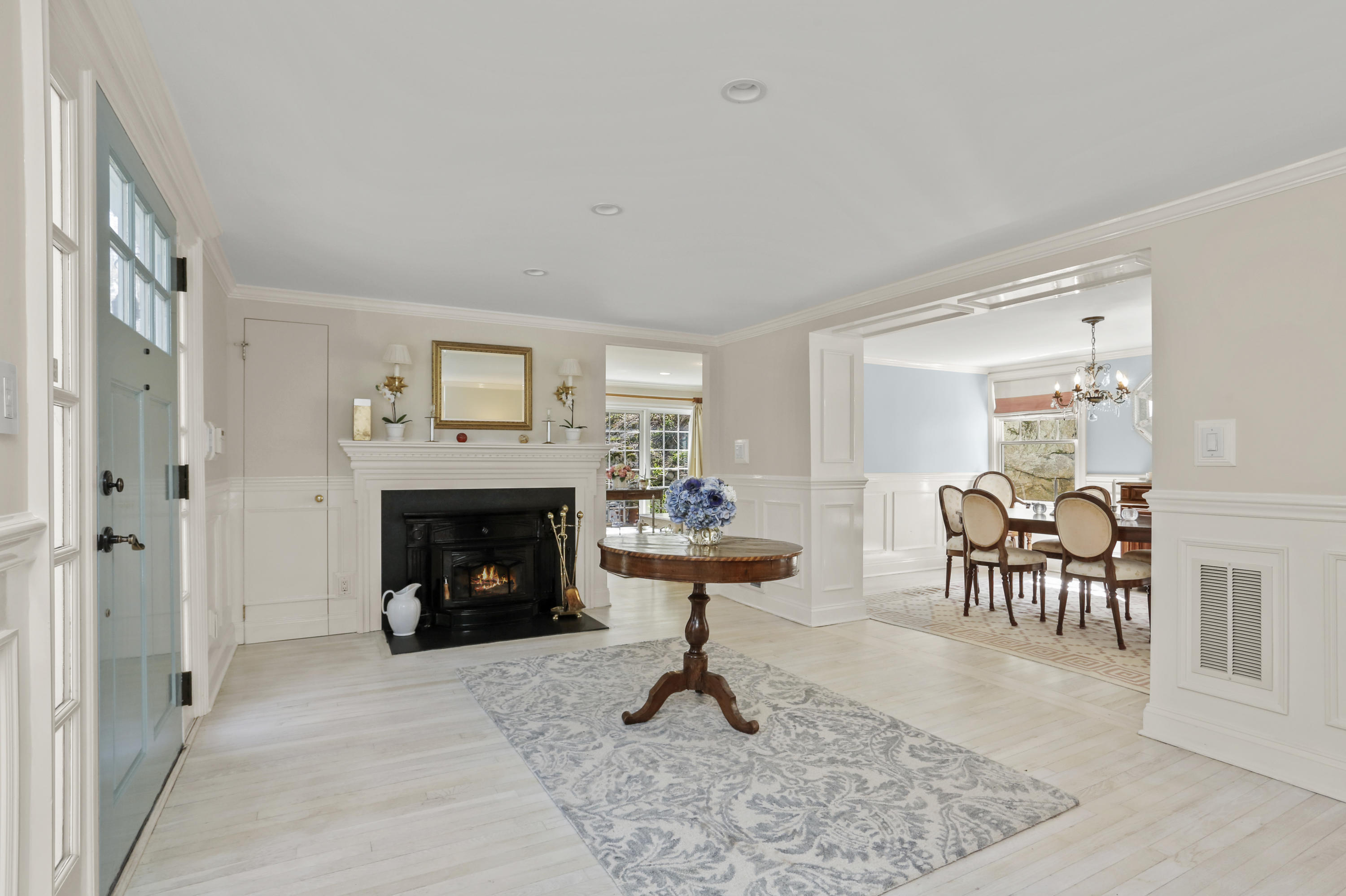 23 Fairmead Road Darien, CT 06820 - Photo 3 of 47 a living room with furniture and a fireplace
