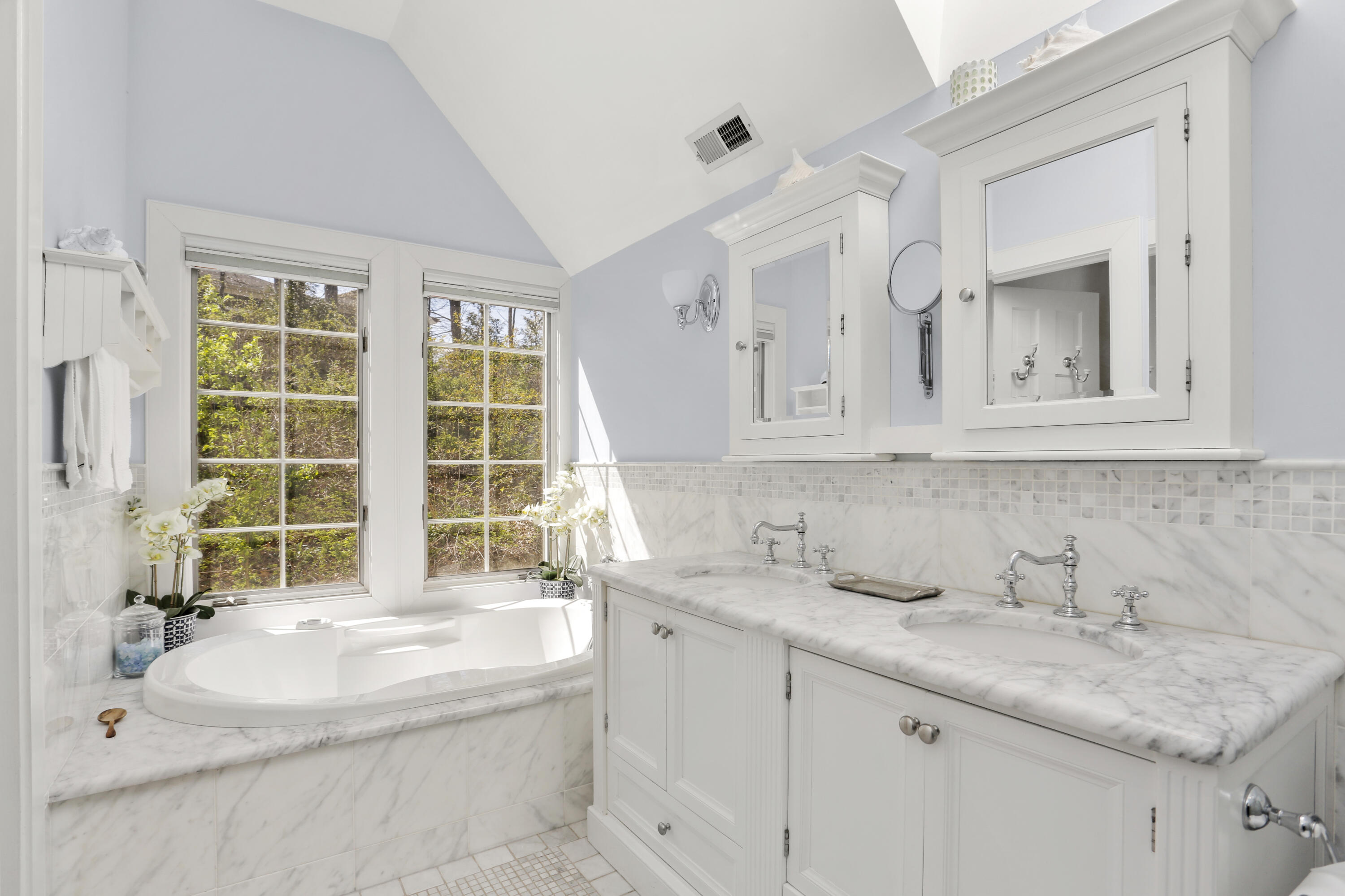 23 Fairmead Road Darien, CT 06820 - Photo 22 of 47 a bathroom with a granite countertop sink and a bathtub