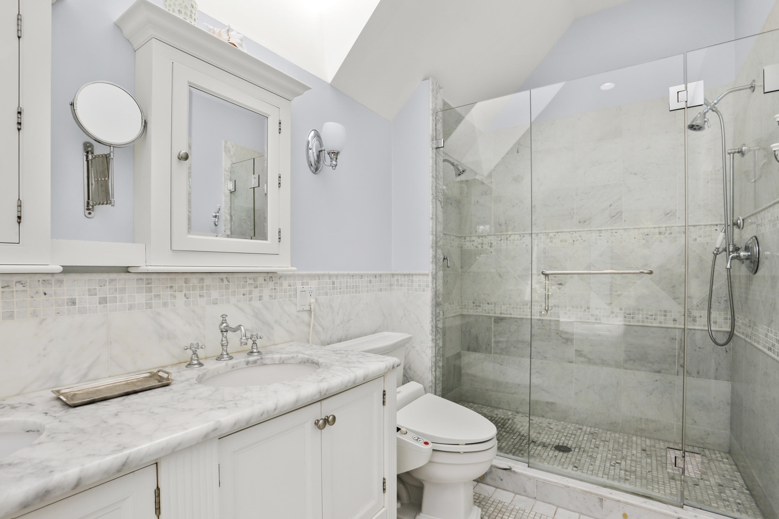 23 Fairmead Road Darien, CT 06820 - Photo 23 of 47 a bathroom with a granite countertop sink mirror and toilet