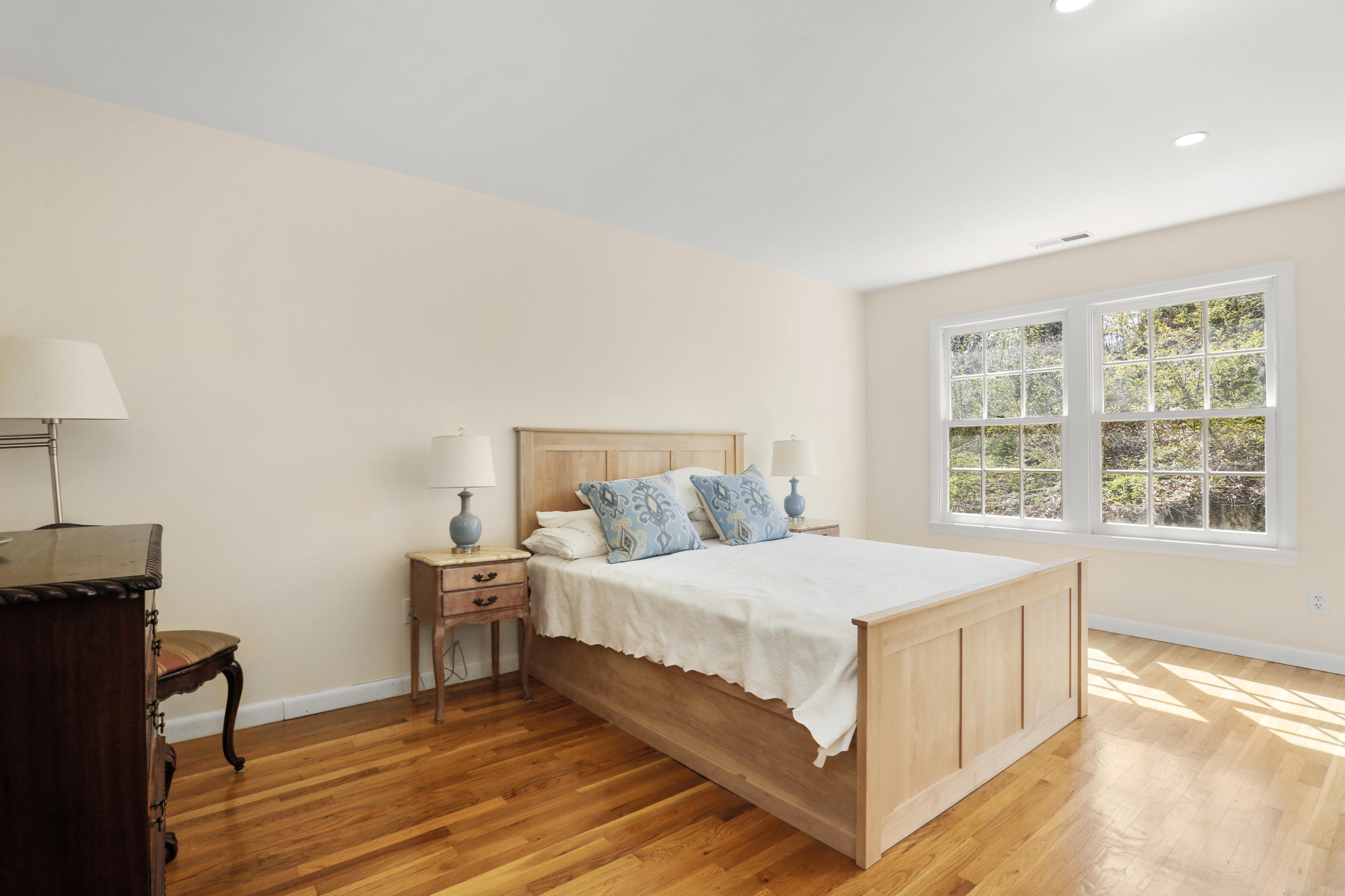 23 Fairmead Road Darien, CT 06820 - Photo 24 of 47 a bedroom with a bed and a window