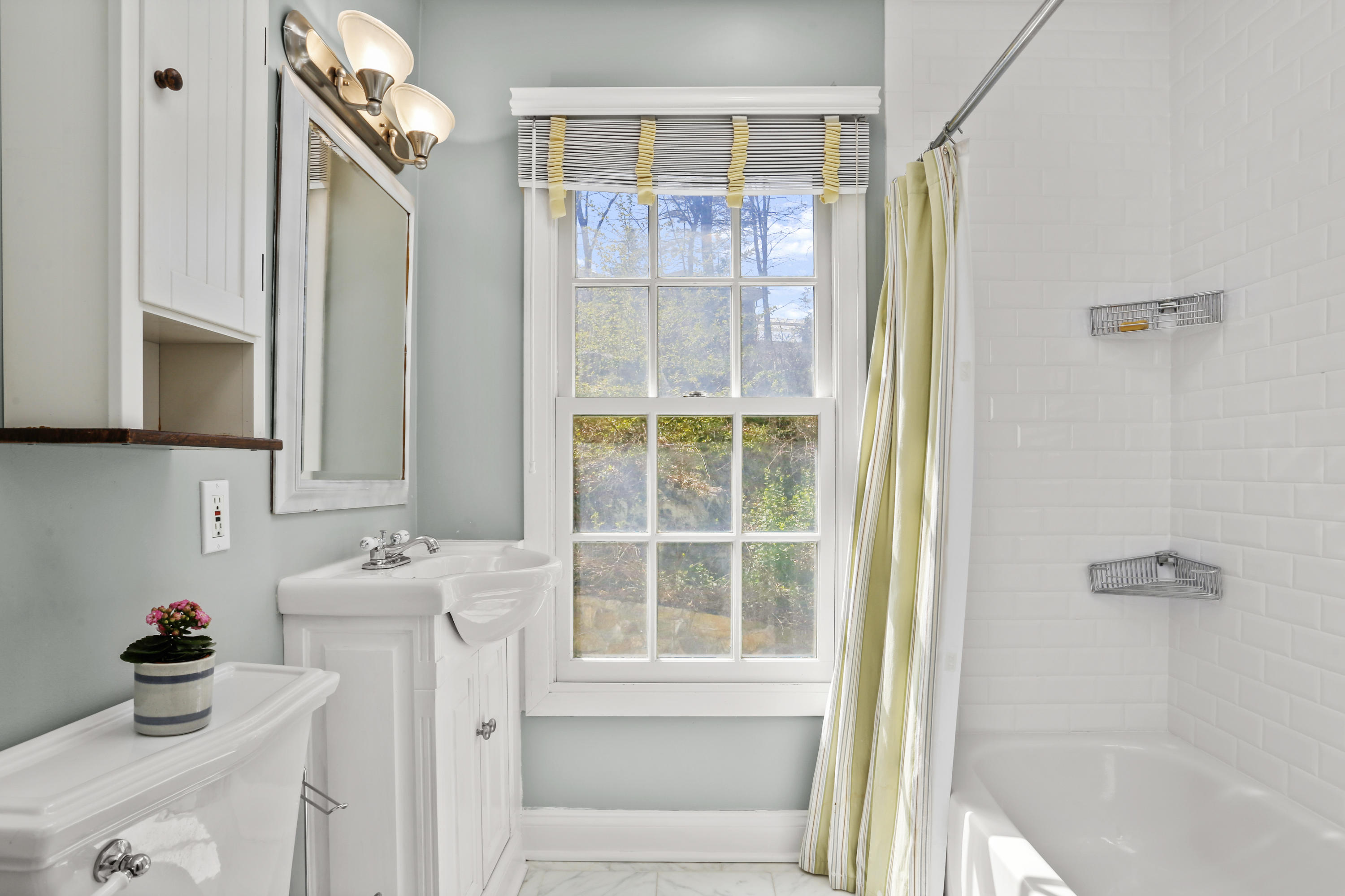 23 Fairmead Road Darien, CT 06820 - Photo 27 of 47 a bathroom with a sink a toilet and a shower