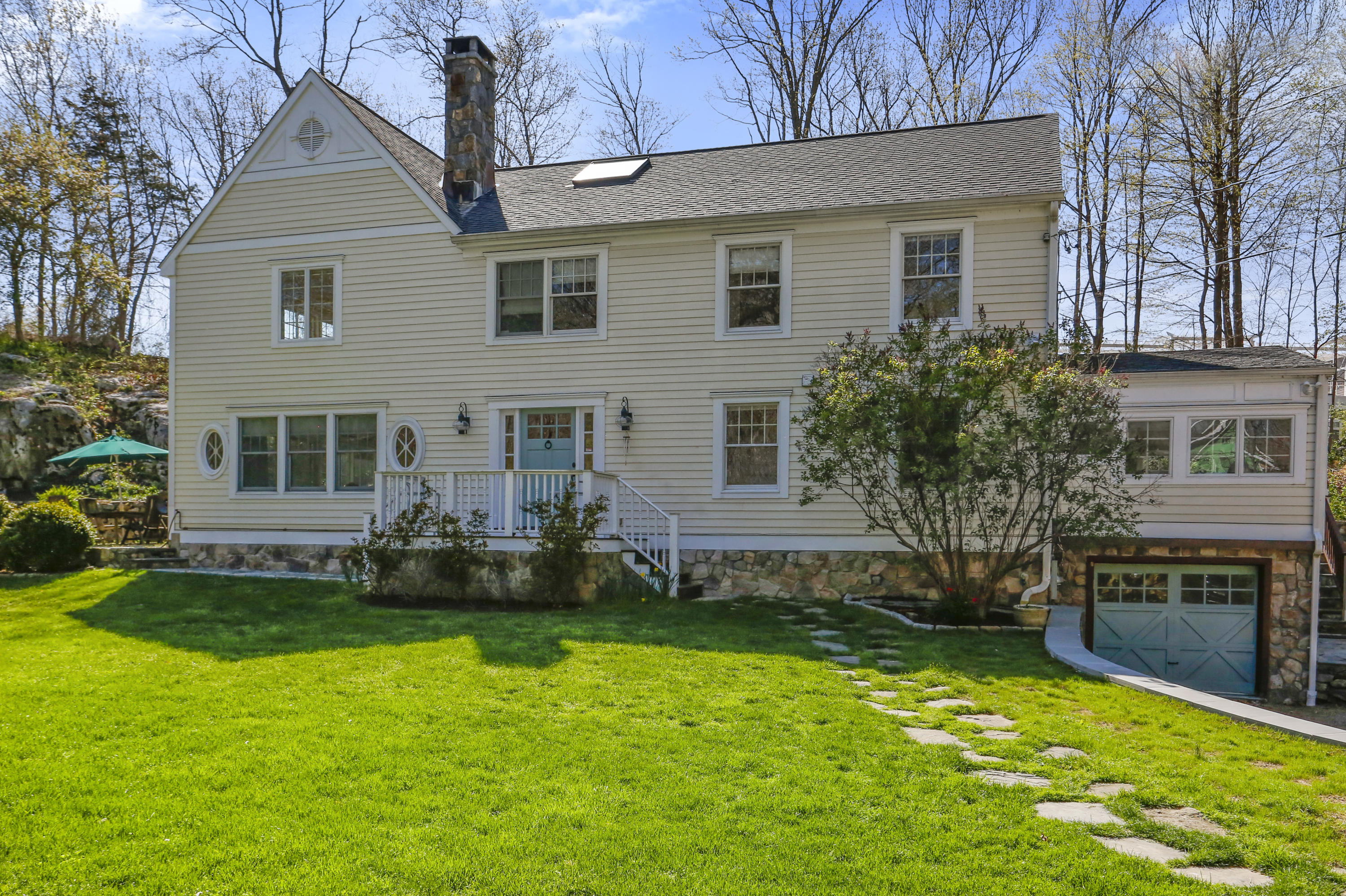 23 Fairmead Road Darien, CT 06820 - Photo 38 of 47 a front view of a house with a garden
