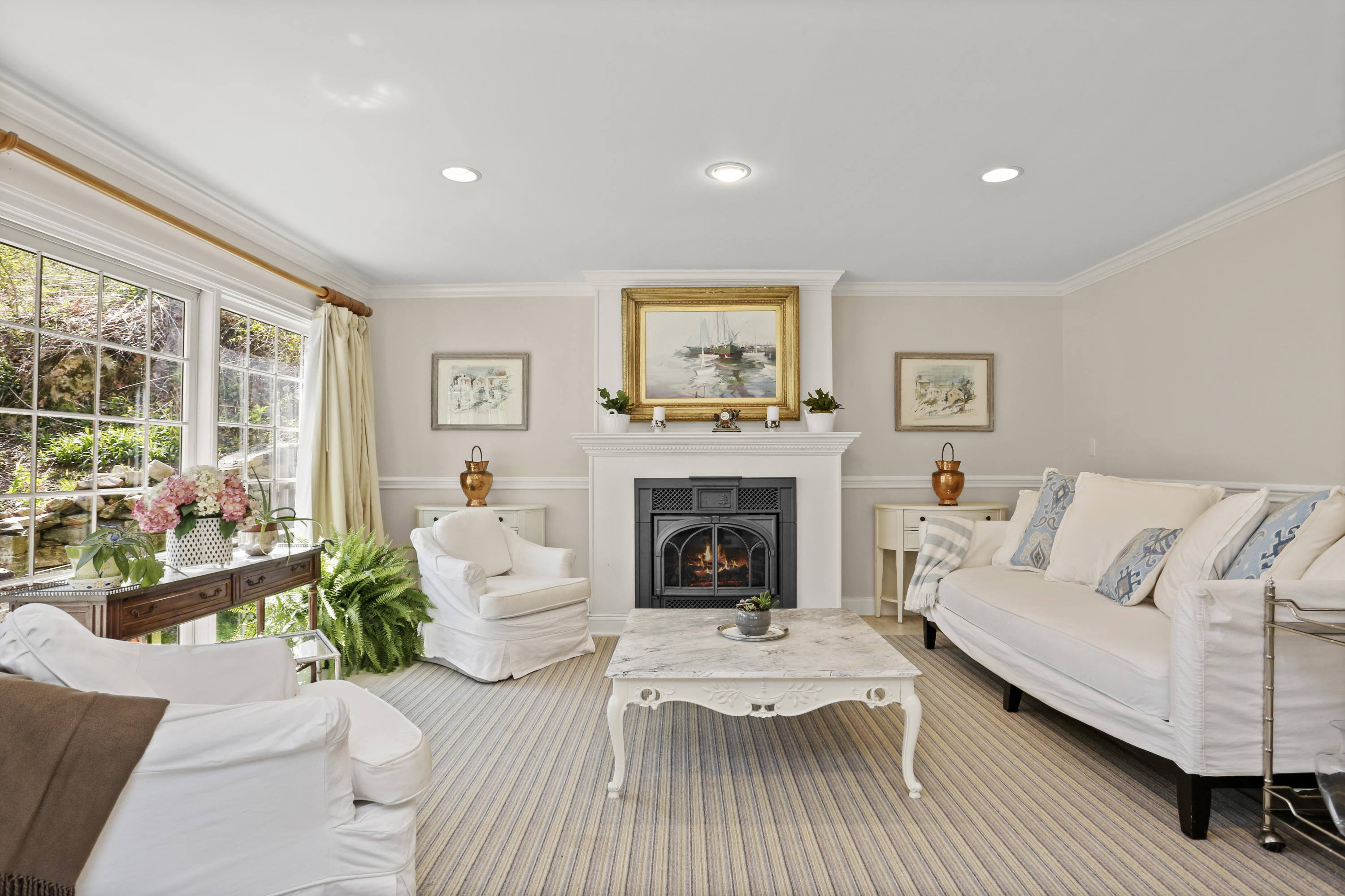 23 Fairmead Road Darien, CT 06820 - Photo 6 of 47 a living room with furniture and a fireplace