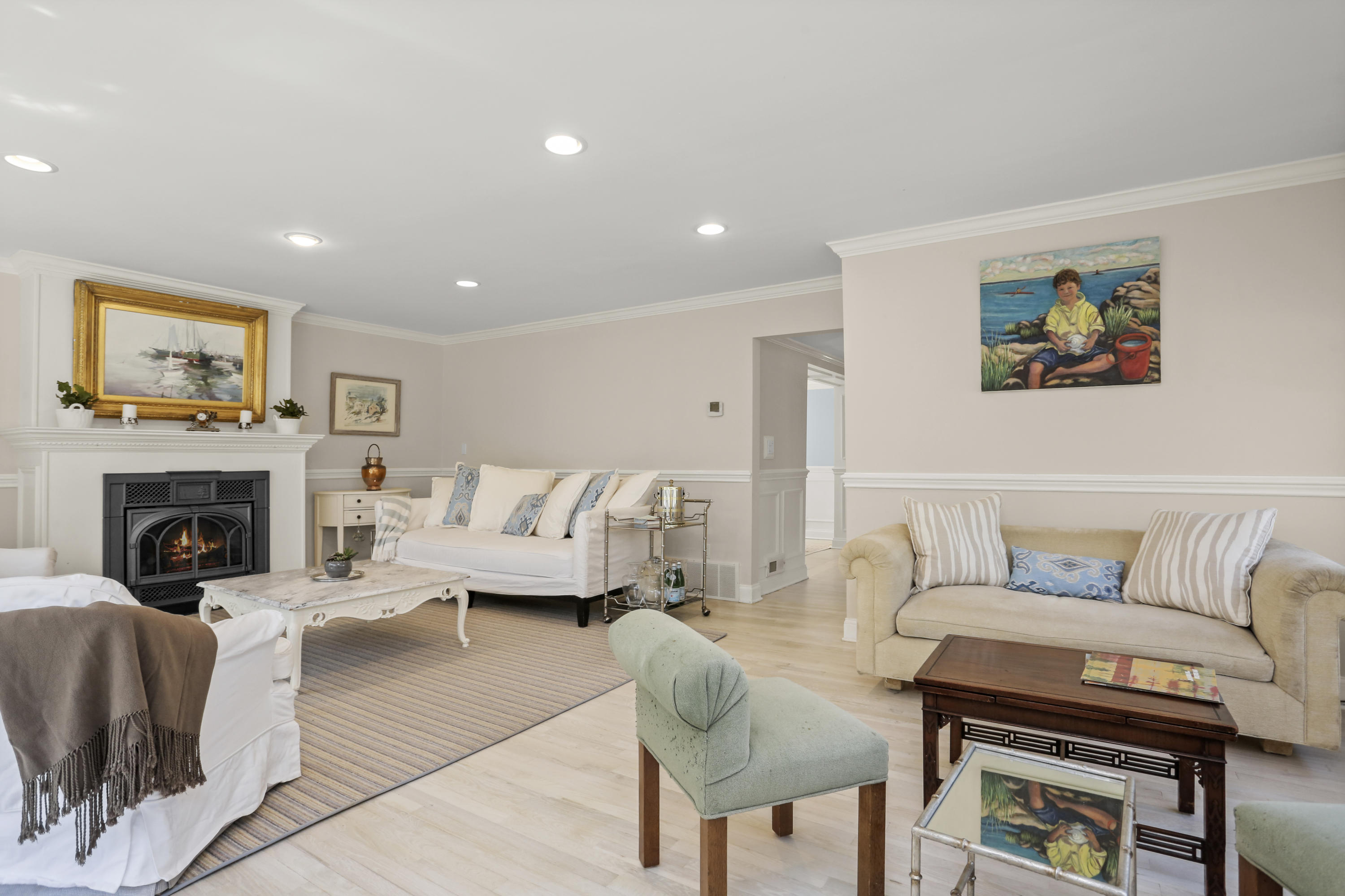 23 Fairmead Road Darien, CT 06820 - Photo 7 of 47 a living room with furniture and a fireplace