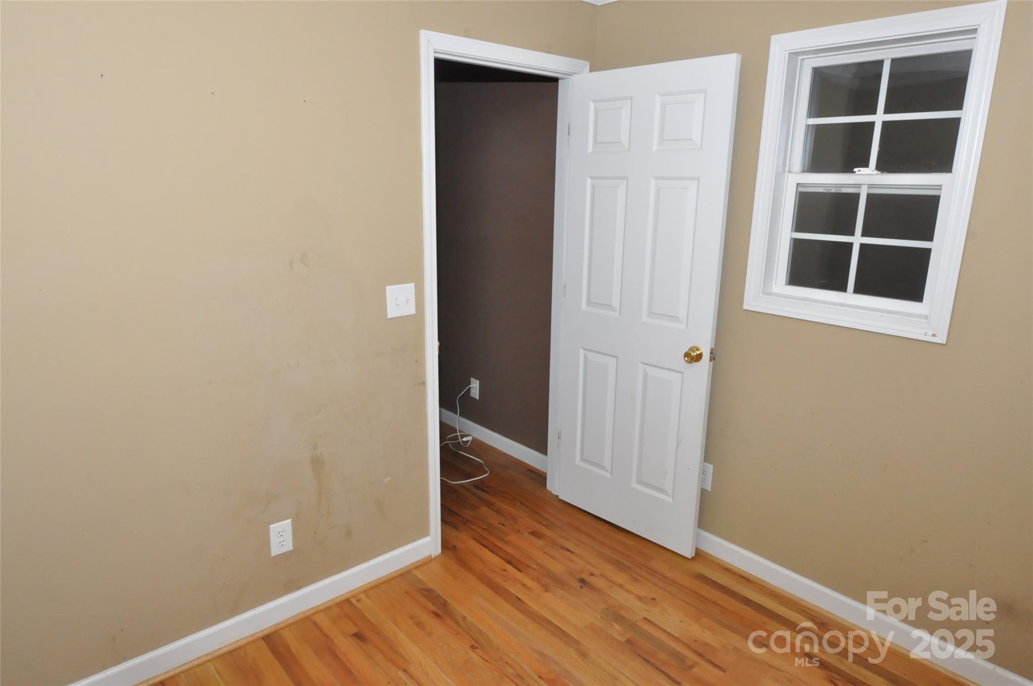1126 Williamsville Church Road Chester, SC 29706 - Photo 19 of 33 a view of empty room with wooden floor and window