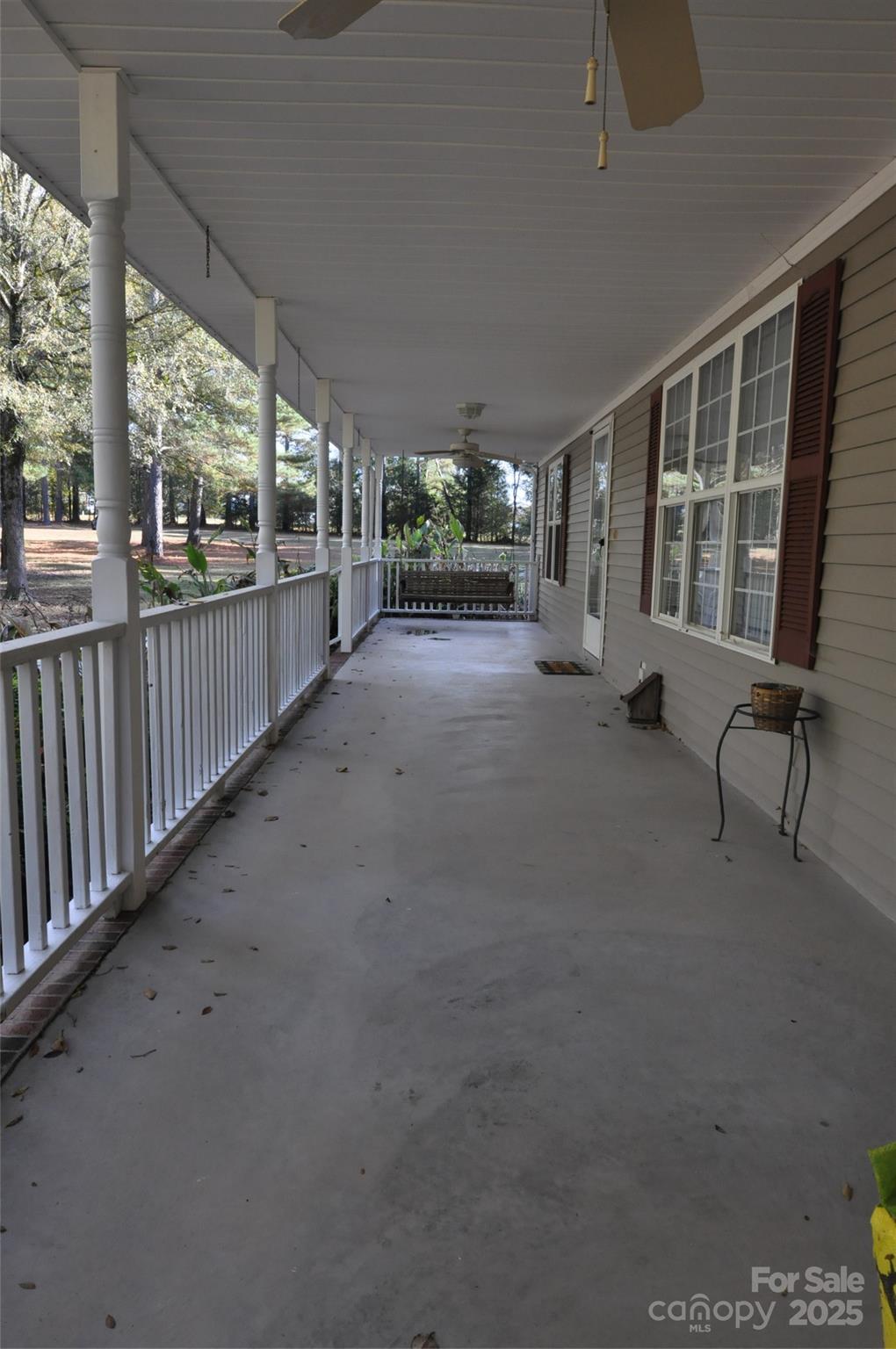 1126 Williamsville Church Road Chester, SC 29706 - Photo 28 of 33 a view of a porch with furniture and floor to ceiling window