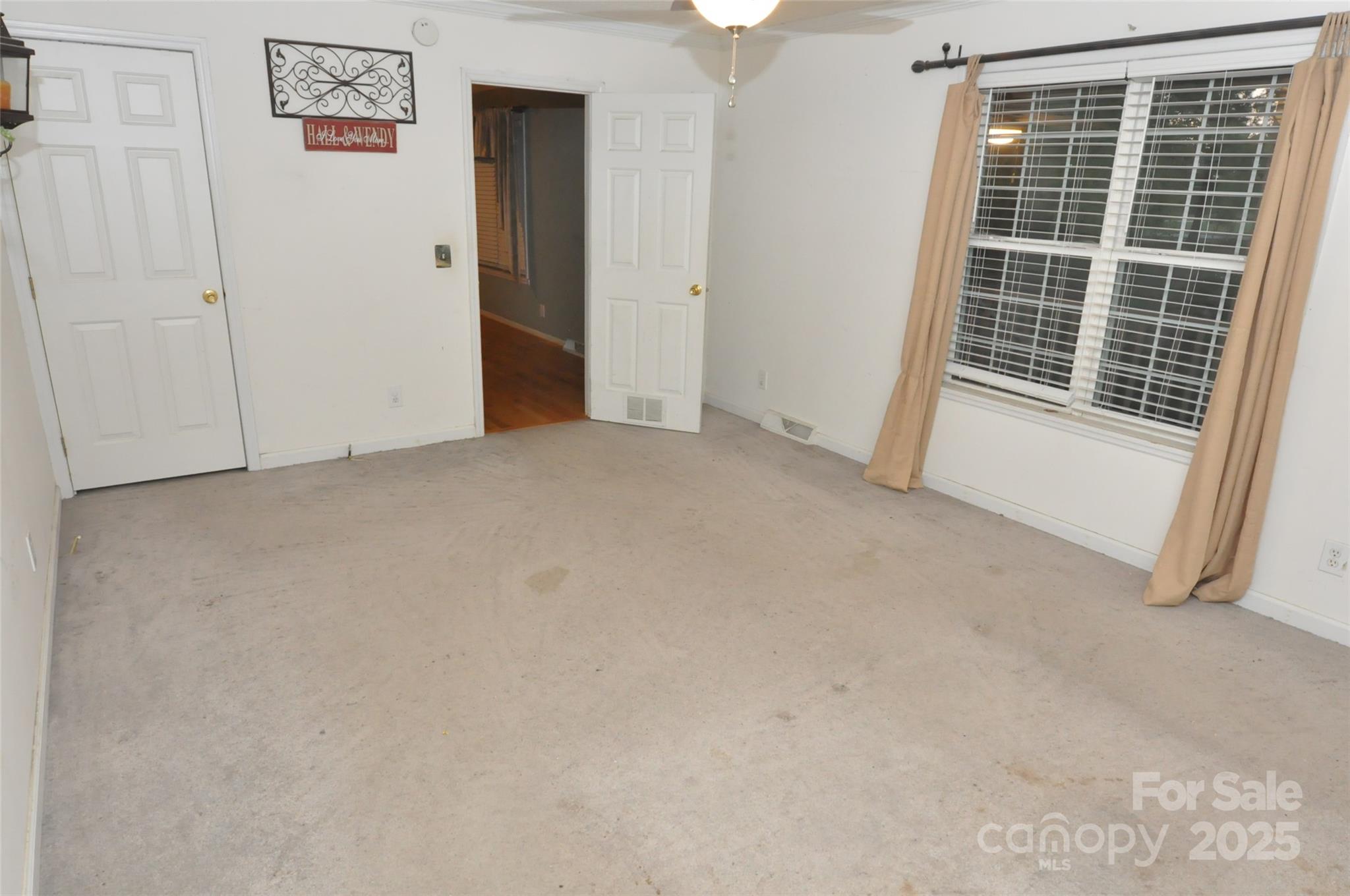 1126 Williamsville Church Road Chester, SC 29706 - Photo 5 of 33 a view of an empty room with a window