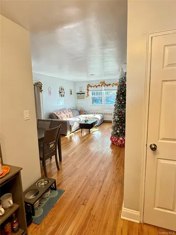 a workspace with furniture and wooden floor