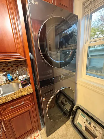a close view of sink and cabinets