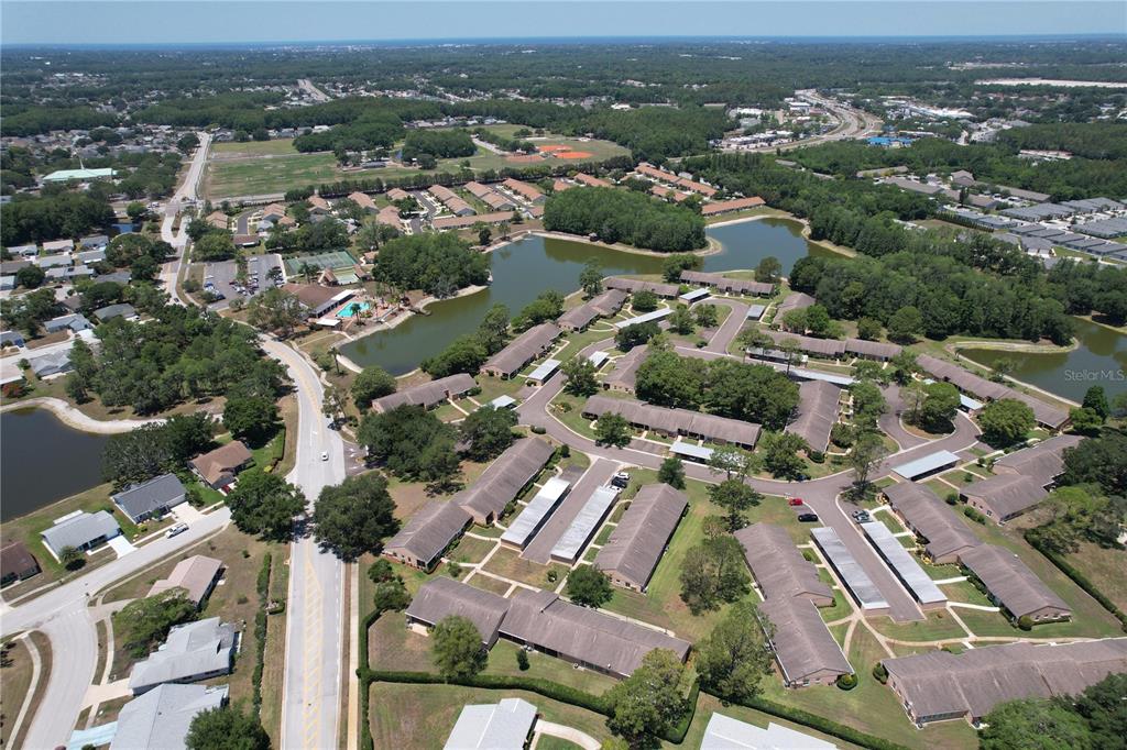 9319 Trowbridge Court New Port Richey, FL 34655 - Photo 68 of 78 an aerial view of a city with lots of residential buildings