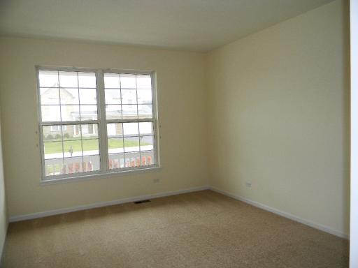 1782 Prairie Ridge Circle Lindenhurst, IL 60046 - Photo 11 of 15 an empty room with a window