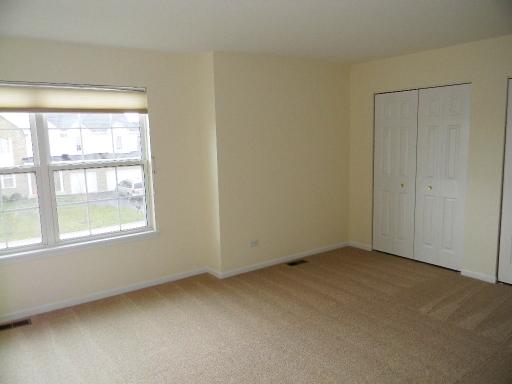 1782 Prairie Ridge Circle Lindenhurst, IL 60046 - Photo 12 of 15 an empty room with a window
