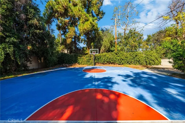 a vase of flowers sitting on a dining table