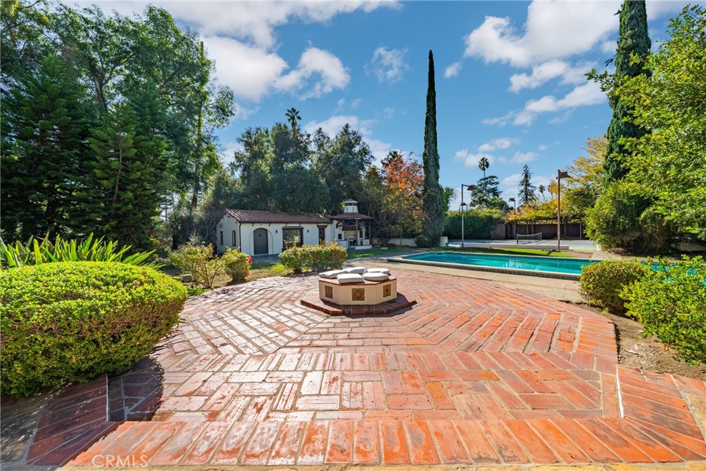 1591 Virginia Road San Marino, CA 91108 - Photo 27 of 74 a front view of a house with garden