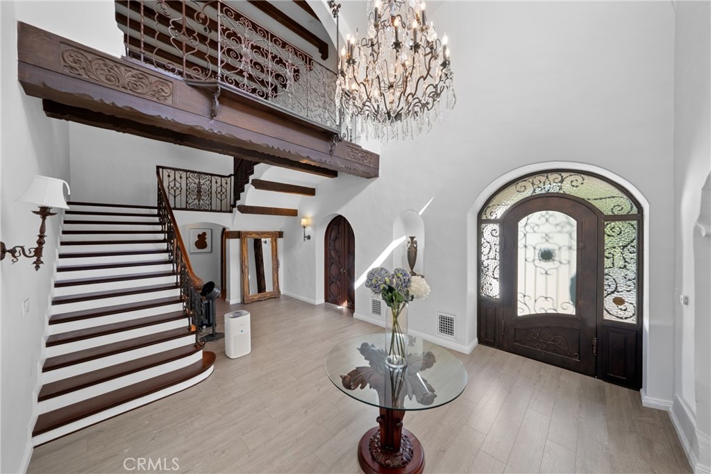 1591 Virginia Road San Marino, CA 91108 - Photo 32 of 74 a vase of flowers sitting on a dining table