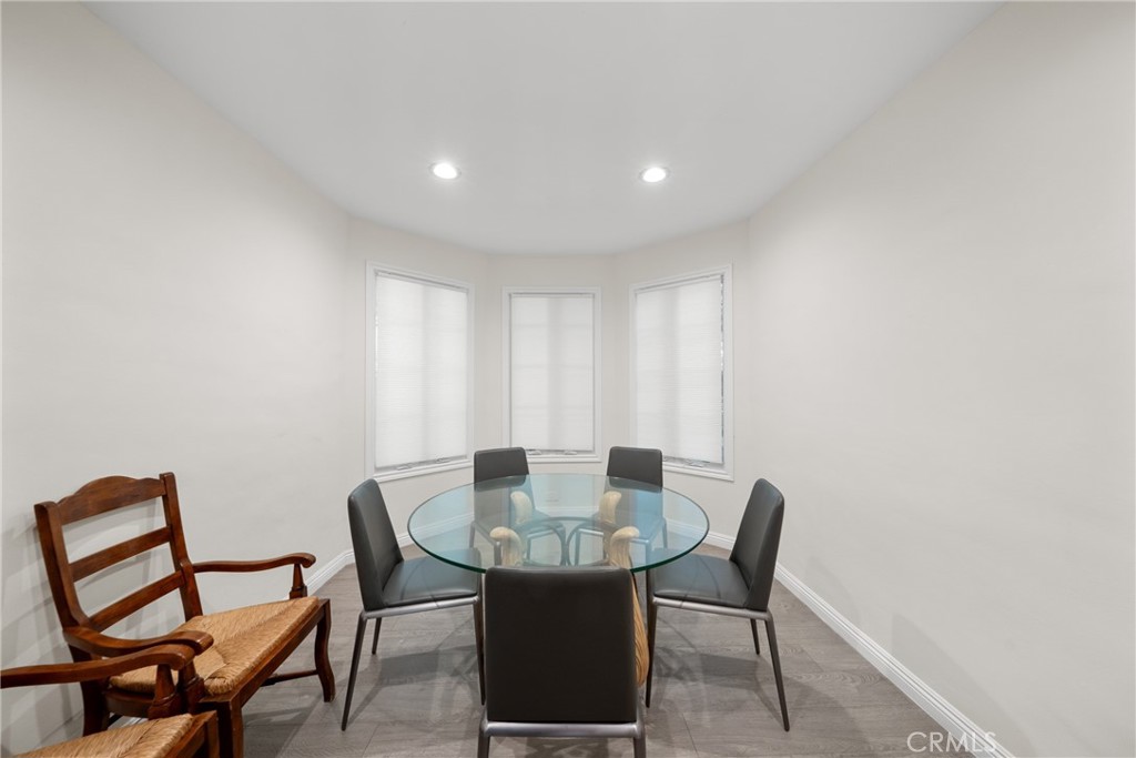 1591 Virginia Road San Marino, CA 91108 - Photo 37 of 74 a view of a dining room with furniture and wooden floor