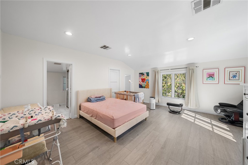 1591 Virginia Road San Marino, CA 91108 - Photo 40 of 74 a bedroom with a bed and a couch