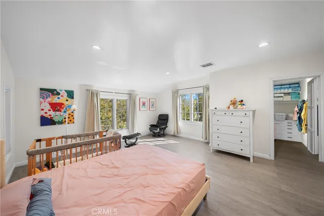 a bathroom with a shower sink and mirror