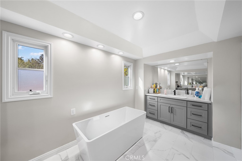1591 Virginia Road San Marino, CA 91108 - Photo 42 of 74 a large bathroom with a bathtub and a sink