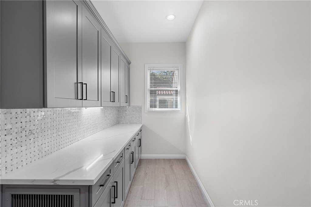 1591 Virginia Road San Marino, CA 91108 - Photo 44 of 74 an empty room with wooden floor and windows