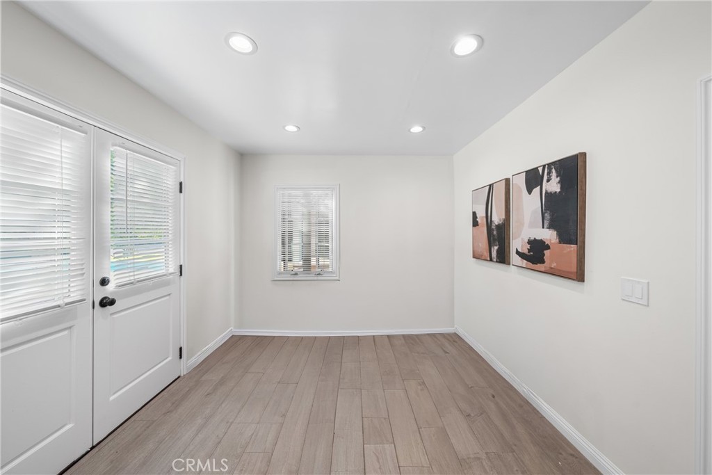 1591 Virginia Road San Marino, CA 91108 - Photo 46 of 74 wooden floor in an empty room with a window