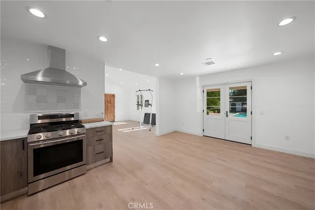 a room with a bed and window