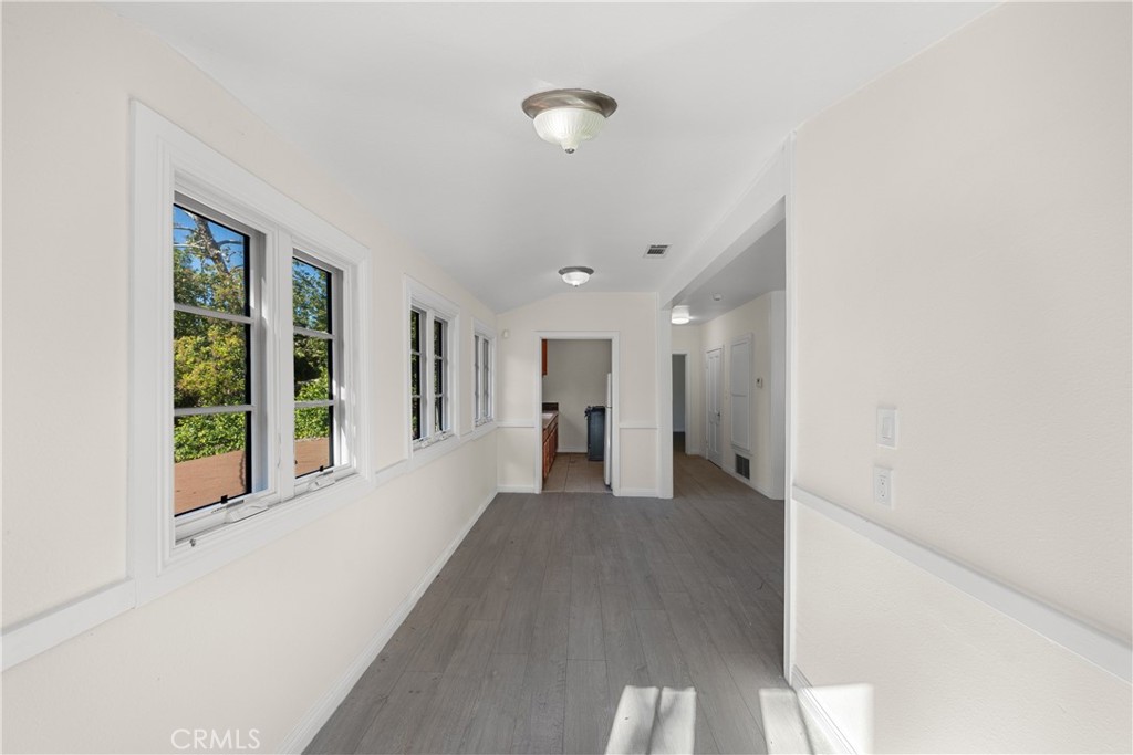 1591 Virginia Road San Marino, CA 91108 - Photo 64 of 74 a view of a big room with windows and cabinet
