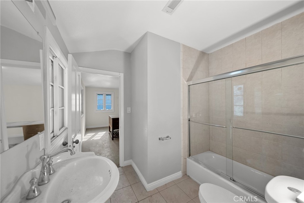 1591 Virginia Road San Marino, CA 91108 - Photo 68 of 74 a bathroom with a sink toilet and shower