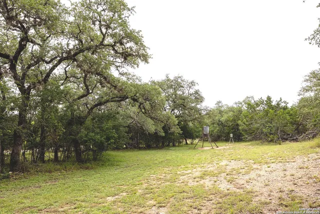 a view of a patio with table and chairs in patio