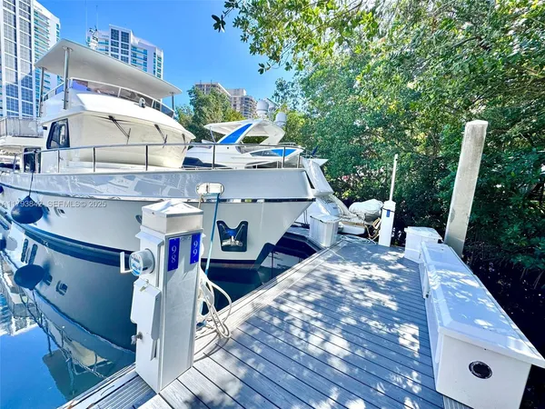 $475,000 | 3575 Mystic Pointe Drive, Aventura, FL 33180