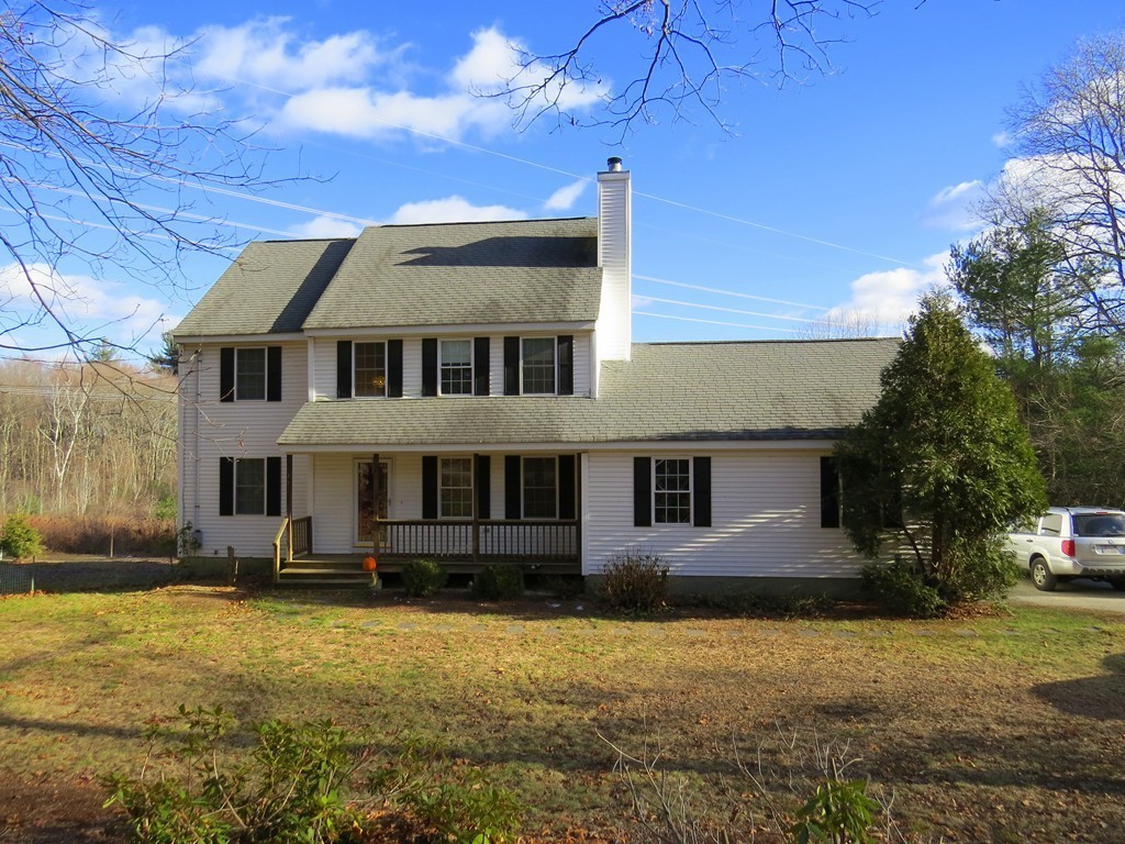 11 Smith Road Sutton, MA 01590 - Photo 1 of 11 a front view of a house with garden