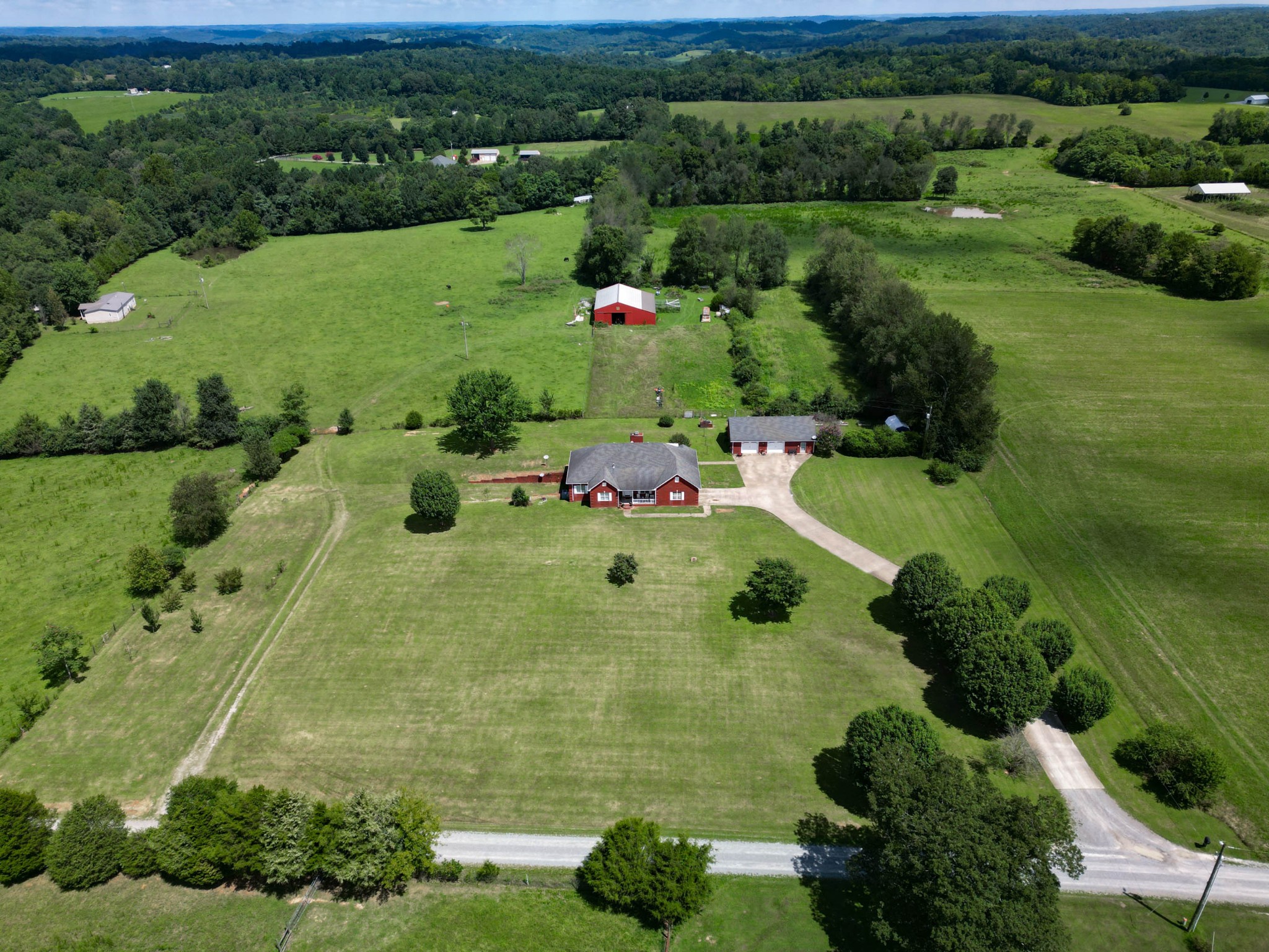 21 Partin Road Taft, TN 38488 - Photo 1 of 30 a view of a garden with an outdoor space