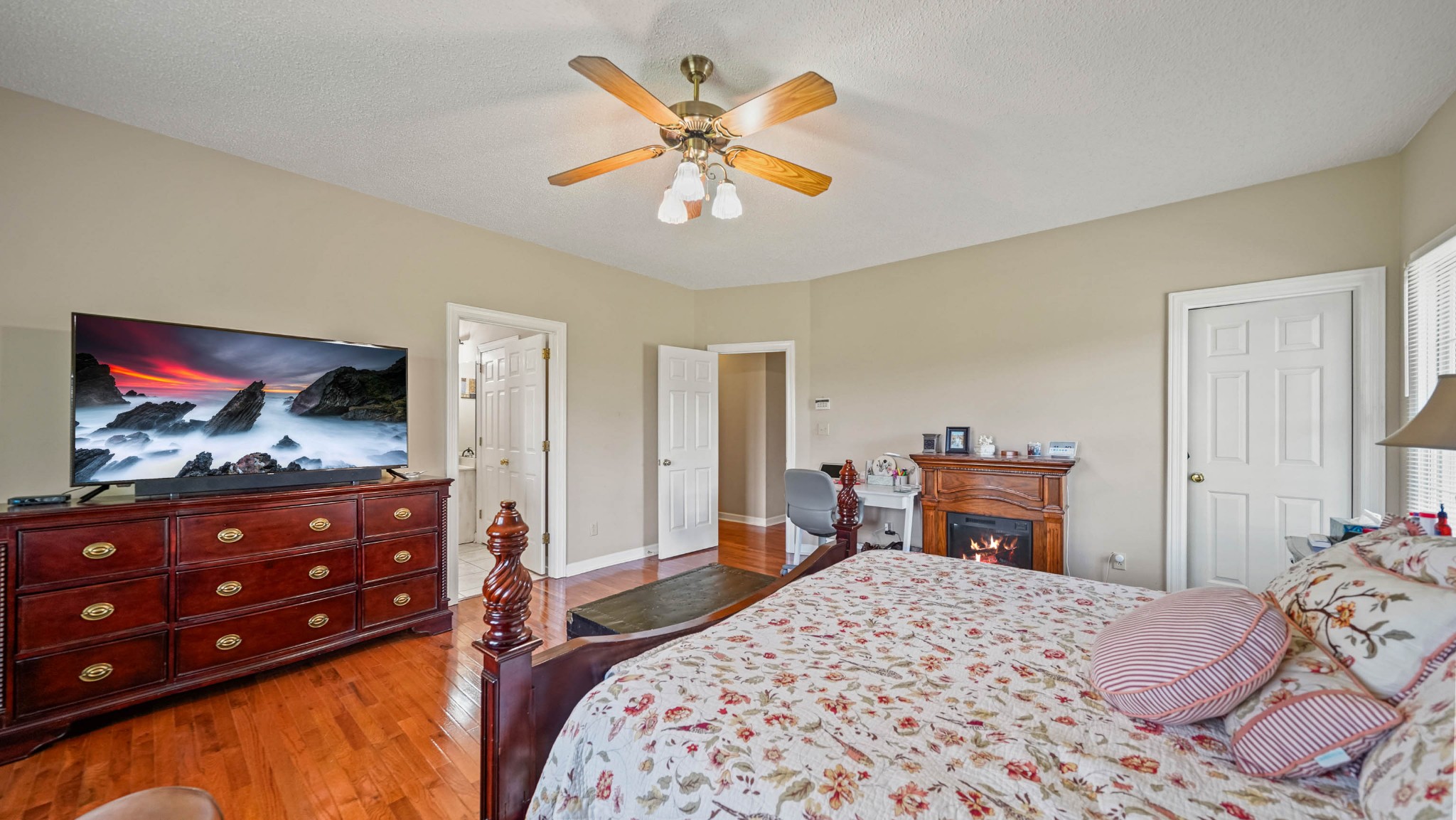 21 Partin Road Taft, TN 38488 - Photo 17 of 30 a bedroom with a bed and a chandelier