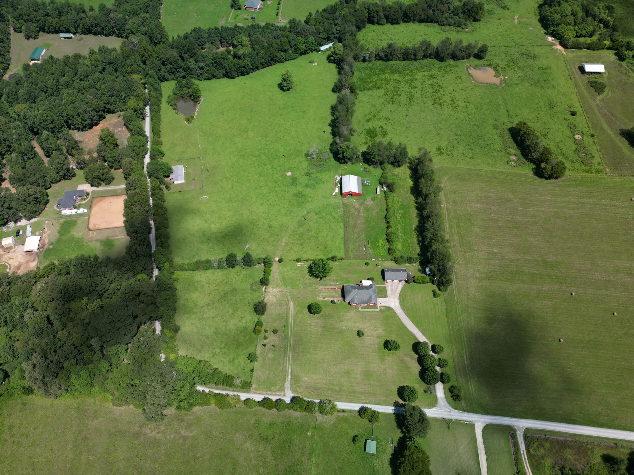21 Partin Road Taft, TN 38488 - Photo 28 of 30 an aerial view of a residential houses with outdoor space and trees all around