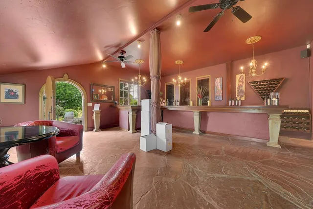 a view of entryway with a table and chairs