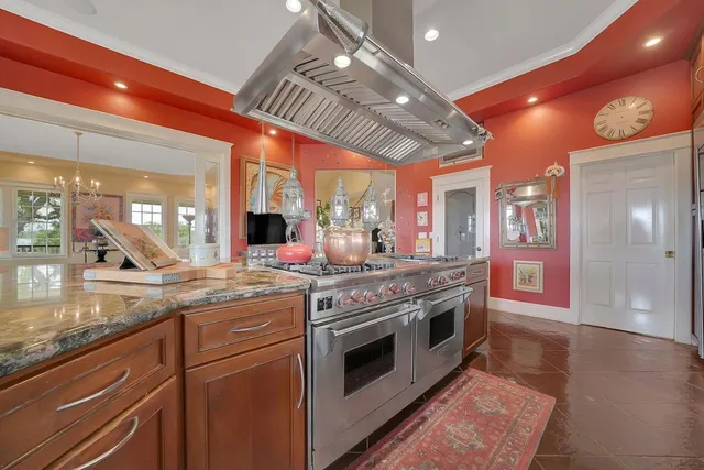 a spacious bathroom with a granite countertop tub shower and sink