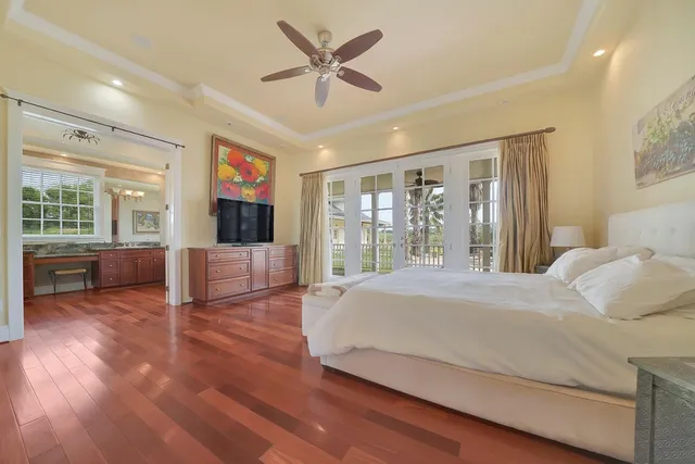 a wooden bench sitting in front of a building