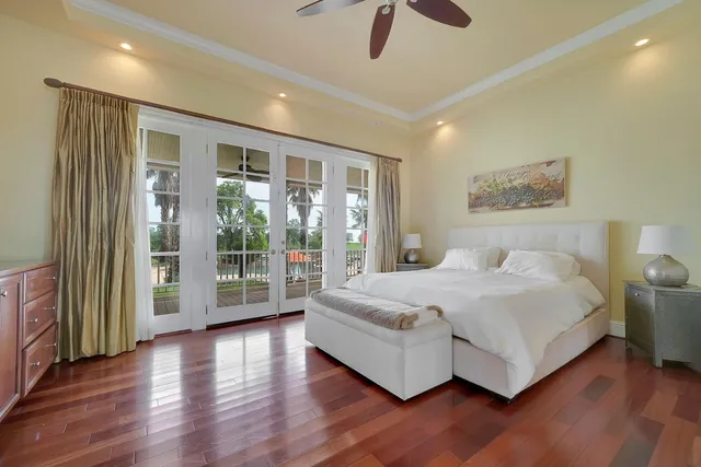 an aerial view of a house with a garden and trees
