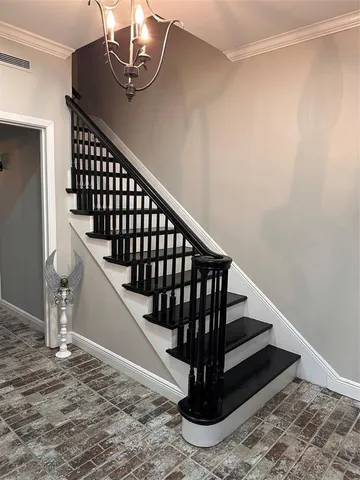 a room with lots of chairs and mirrors