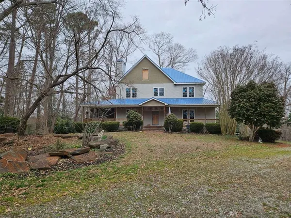 a house view with a garden space