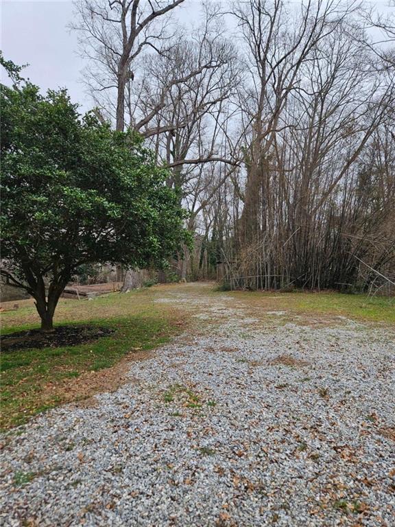 228 Storey Street Jefferson, GA 30549 - Photo 5 of 6 a view of backyard with green space