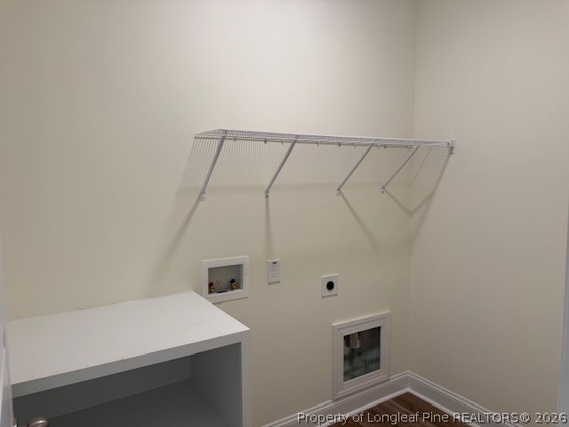 180 Rabbit Run Drive Smithfield, NC 27577 - Photo 12 of 19 a bathroom with a sink and a mirror