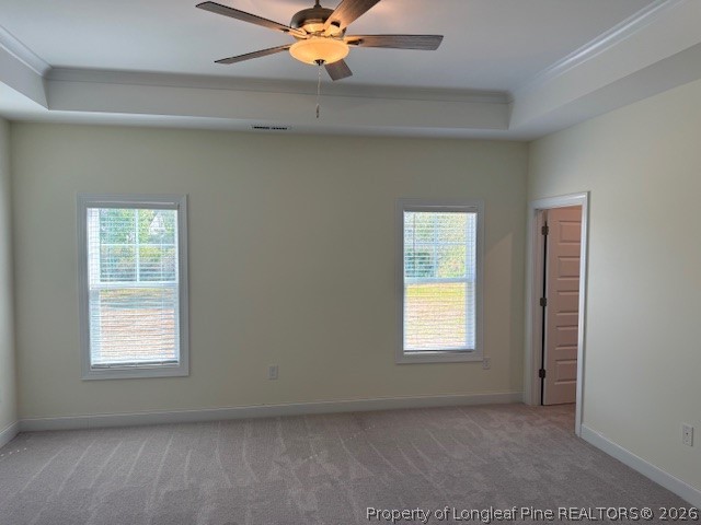 180 Rabbit Run Drive Smithfield, NC 27577 - Photo 14 of 19 an empty room with windows and fan