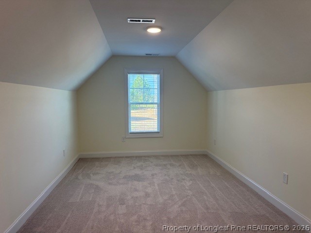 180 Rabbit Run Drive Smithfield, NC 27577 - Photo 18 of 19 wooden floor in an empty room with a window