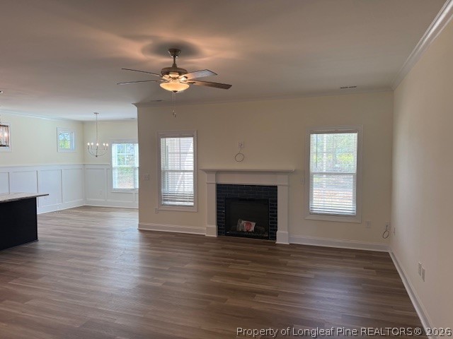 180 Rabbit Run Drive Smithfield, NC 27577 - Photo 3 of 19 a view of an empty room with wooden floor fireplace and a window