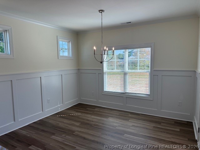 180 Rabbit Run Drive Smithfield, NC 27577 - Photo 5 of 19 a view of a room with wooden floor and windows
