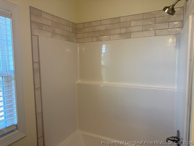 180 Rabbit Run Drive Smithfield, NC 27577 - Photo 8 of 19 a bathroom with a shower