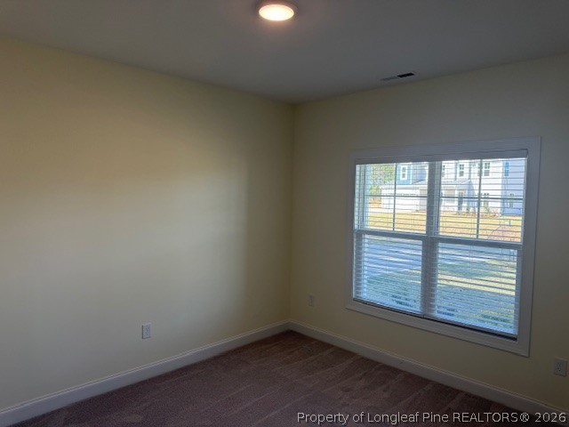 180 Rabbit Run Drive Smithfield, NC 27577 - Photo 10 of 19 an empty room with a window